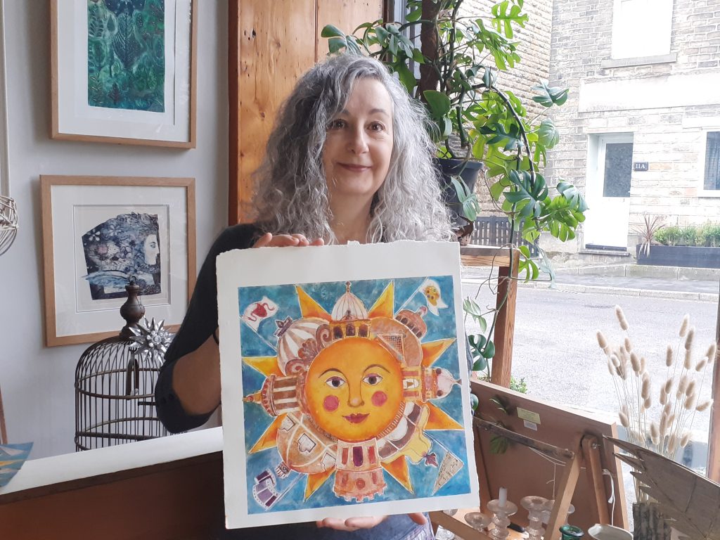 Picture shows Joanna Allen with her winning artwork for the Fringe 2022 cover (picture credit: Gaye Chorlton